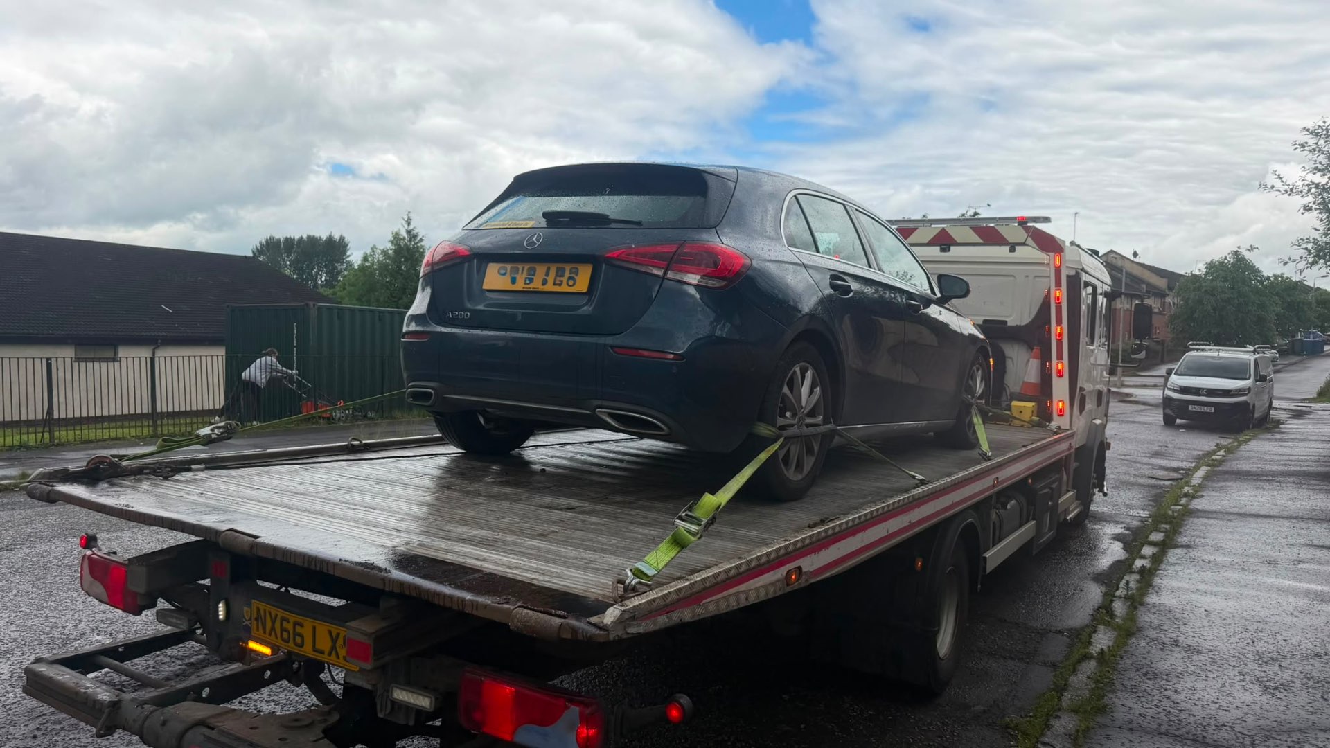 Mercedes A200 secured on MZL recovery flatbed