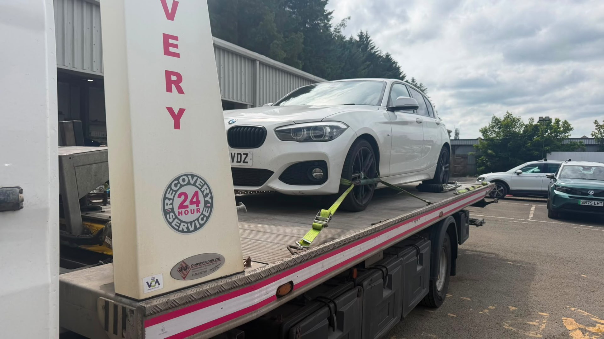 White BMW 1 Series secured on 24-hour recovery flatbed