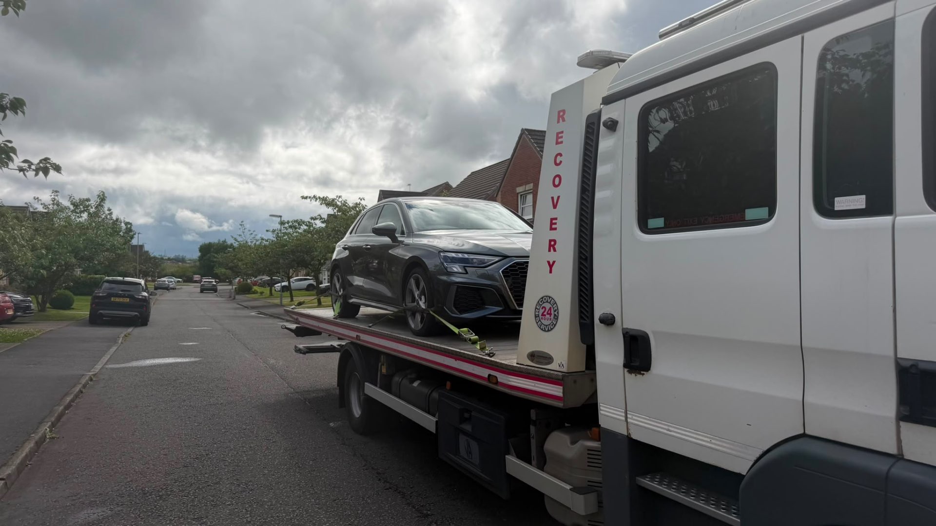Black Audi A3 S-Line secured on MZL 24-hour recovery flatbed